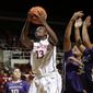 Stanford forward Chiney Ogwumike (13) goes up for a layup during the second half of an NCAA college basketball game against Washington on Thursday, Feb. 27, 2014, in Stanford, Calif. Stanford won 83-60. (AP Photo/Marcio Jose Sanchez)
