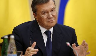 Ukraine&#39;s fugitive President Viktor Yanukovych speaks at a news conference in Rostov-on-Don, a city in southern Russia about 1,000 kilometers (600 miles) from Moscow, Friday, Feb. 28, 2014. Yanukovych, making his first public appearance since fleeing Ukraine, said he was forced to leave the country after his family received threats. (AP Photo/Pavel Golovkin)