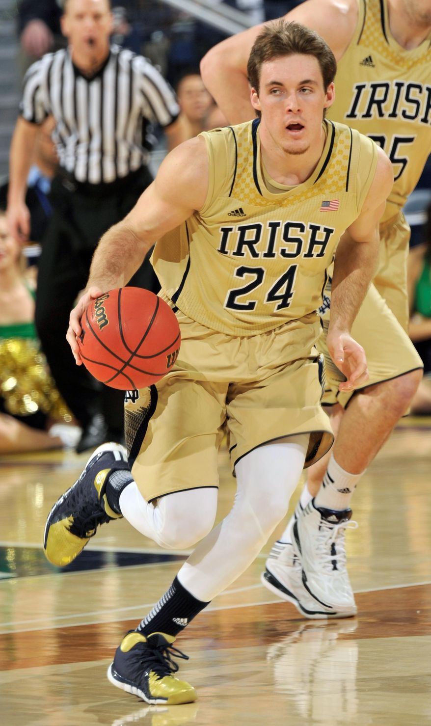 Notre Dame guard Pat Connaughton heads up court in the first half of an NCAA college basketball game with Pittsburgh, Saturday, March 1, 2014, in South Bend, Ind. (AP Photo/Joe Raymond)