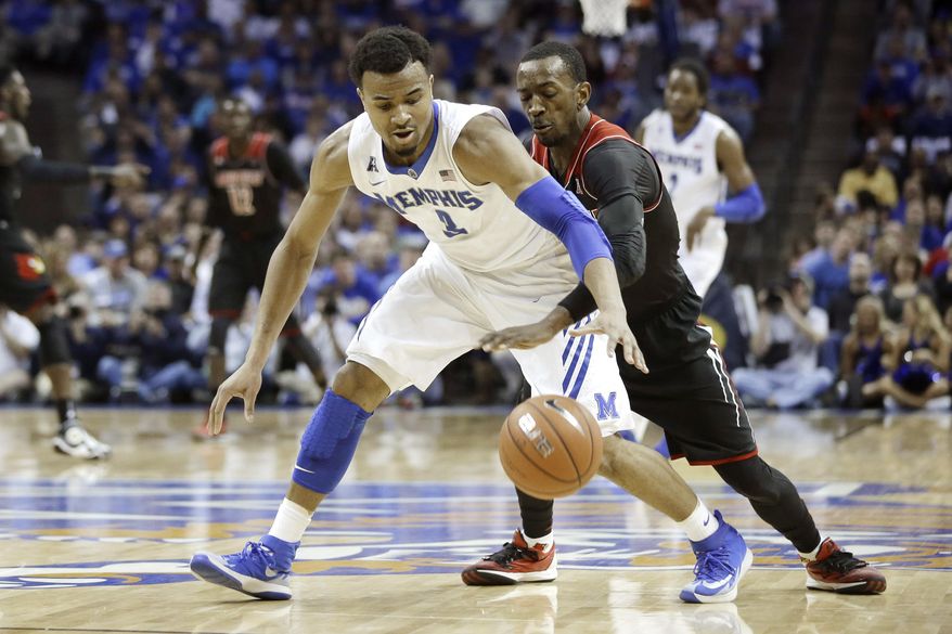 Louisville's Russ Smith, right, slaps the ball away from Memphis' Chris Crawford (3) in the first half of an NCAA college basketball game in Memphis, Tenn., Saturday, March 1, 2014. (AP Photo/Danny Johnston)