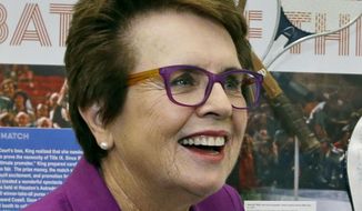 FILE - In this Sept. 5, 2013, file photo, Billie Jean King reflects about her match against Bobby Riggs in 1973 as she stands in front of a display at the U.S. Open tennis tournament in New York. King watched the gold-medal hockey game won by Canada, greeted U.S. athletes and met with a Russian gay teenager in her whirlwind three days at the Sochi Olympics. She&#x27;d like the IOC to add sexual orientation to its charter and consider the issue when deciding host countries for future Olympics. (AP Photo/Darron Cummings, File)