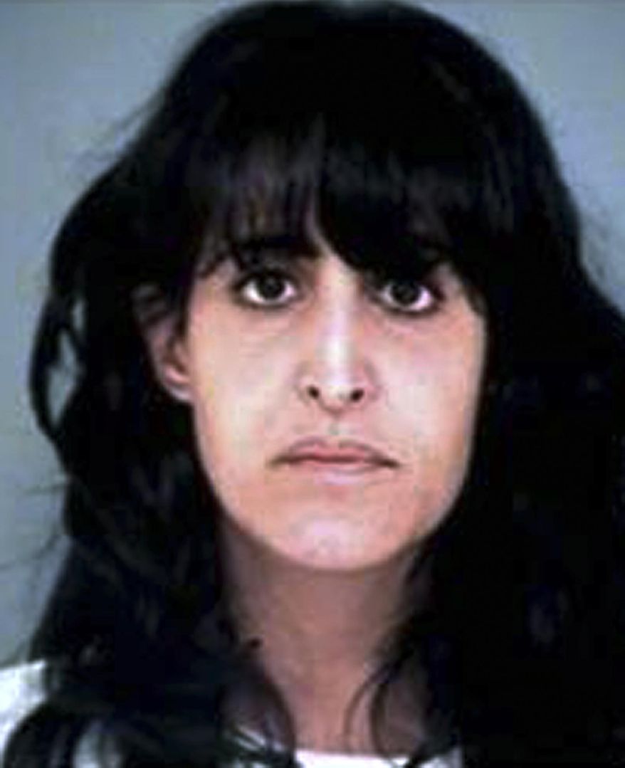This undated booking photo provided by the Simsbury, Conn., Police Department shows Tiffany Stevens, of Bloomfield, Conn, charged with attempted murder for allegedly trying to hire a hit man to kill her ex-husband, Eric Stevens. Tiffany Stevens still has legal custody of their 8-year-old daughter, despite separate efforts by the girl’s father and grandparents to obtain custody after her mother’s arrest. She remains free on $1 million bail. (AP Photo/Simsbury Police Department)