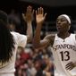 Stanford&#39;s Chiney Ogwumike, right, celebrates with Lili Thompson during the second half of an NCAA college basketball game against Washington State Saturday, March 1, 2014, in Stanford, Calif. (AP Photo/Ben Margot)