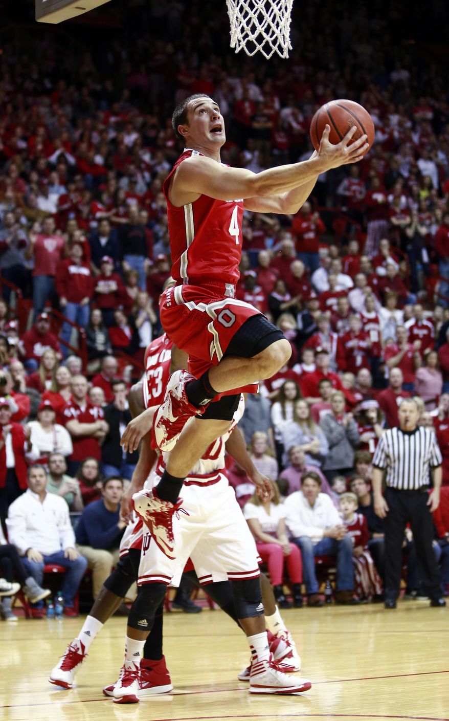Ohio State guard Aaron Craft eyes the basket as he goes up to shoot the basketball in the first half of an NCAA basketball game against Indiana in Bloomington, Ind. Sunday, March 2, 2014. (AP Photo/R Brent Smith)