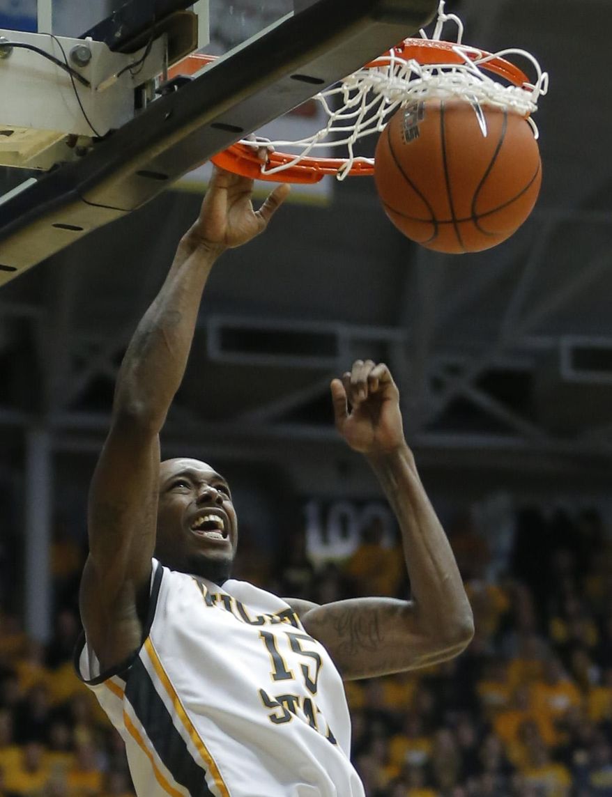 Wichita State's Nick Wiggins dunks against Missouri State during the second half of an NCAA college basketball game in Wichita, Kansas., Saturday, March 1, 2014. (AP Photo/The Wichita Eagle, Travis Heying) LCOAL TV OUT; MAGS OUT; LOCAL RADIO OUT; LOCAL INTERNET OUT