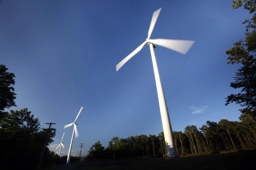 FILE - In this Sunday, July 19, 2009 file photo, windmills catch the breeze on Stetson Mountain, in Range 8, Township 3, Maine. Gov. Paul LePage is proposing, in the 2014 legislative session, to eliminate the wind energy generation goals in Maine law, which the administration says are unrealistic and must be strengthened to ensure. (AP Photo/Robert F. Bukaty, File)