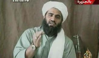 FILE - This image made from video provided by by Al-Jazeera shows Sulaiman Abu Ghaith, Osama bin Laden&#x27;s son-in-law and spokesman. Abu Ghaith goes to trial Monday, March 3, 2014 in New York on charges that he conspired to kill Americans in his role as al-Qaida&#x27;s mouthpiece after the Sept. 11 terrorist attacks. He is the highest-ranking al-Qaida figure to stand trial on U.S. soil since the attacks. (AP Photo/Al-Jazeera, File)
