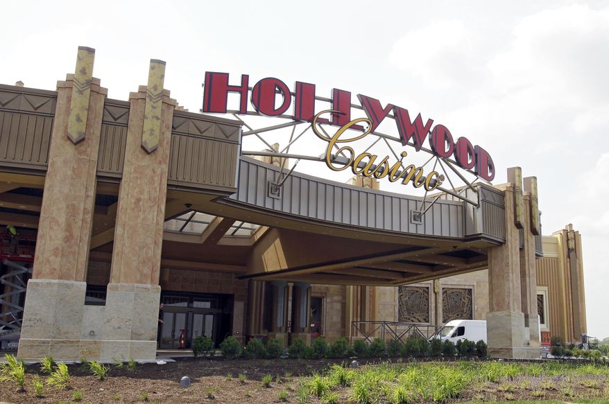 FILE - This photo made Monday, May 21, 2012, shows the Hollywood Casino in Toledo, Ohio. If current revenues hold through March, the four voter-approved casinos in Ohio will be on track for revenues of nearly $900 million during the first full year they've all been operating. (AP Photo/Mark Duncan)