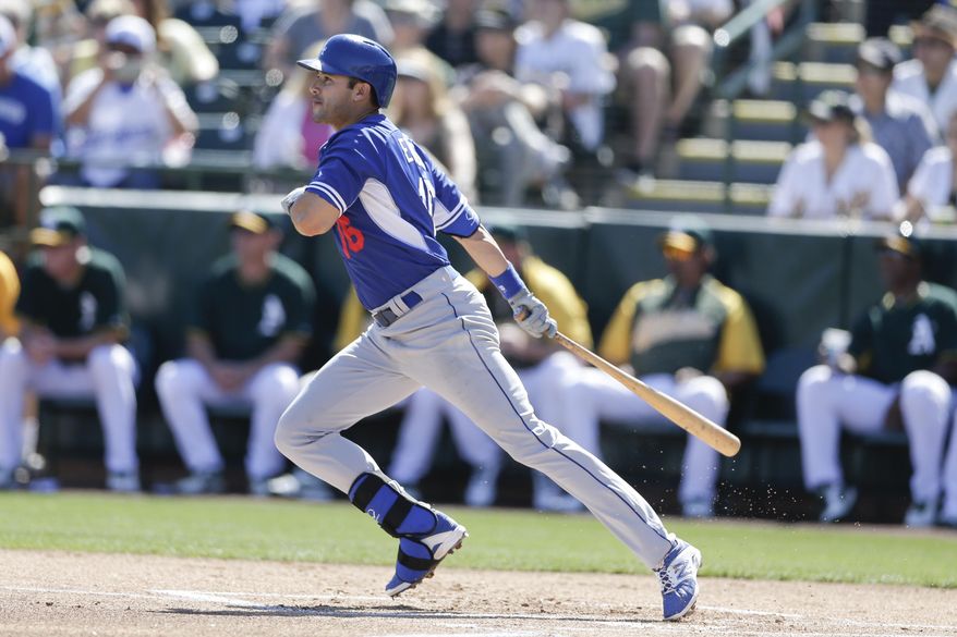 Los Angeles Dodgers' Andre Ethier watches his hit for a single against the Oakland Athletics during the first inning of a spring training baseball game Monday, March 3, 2014, in Phoenix. (AP Photo/Gregory Bull)