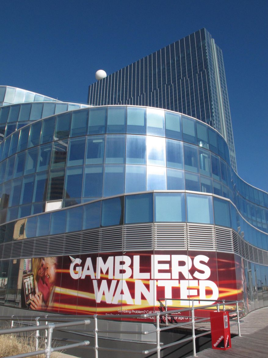 This Dec. 27, 2013 photo shows the exterior of Revel Casino Hotel in Atlantic City, N.J. The Seminole Indian tribe, through its Hard Rock franchise, has been rumored for months to be interested in making a bid for the struggling casino. Hard Rock recently received guidance from New Jersey casino regulators about which of its officials would need to qualify for a casino license in the state. (AP Photo/Wayne Parry)