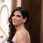 Sandra Bullock arrives at the Oscars on Sunday, March 2, 2014, at the Dolby Theatre in Los Angeles.  (Photo by Jordan Strauss/Invision/AP) ** FILE **