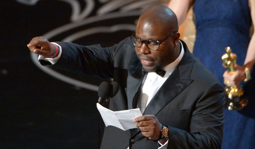 Steve McQueen accepts the award for the best picture of the year for &quot;12 Years a Slave&quot; during the Oscars at the Dolby Theatre on Sunday, March 2, 2014, in Los Angeles.  (Photo by John Shearer/Invision/AP)