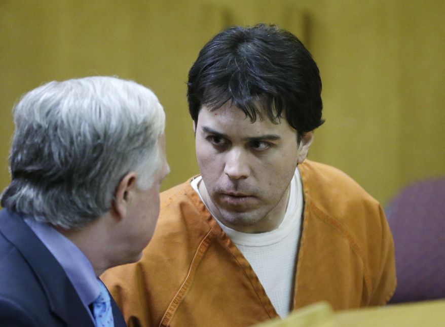 FILE- In a Feb. 4, 2014 file photo, Raulie Casteel, right, talks with his attorney Doug Mullkoff in Pontiac, Mich., during his sentencing. Casteel, a man who kept a swath of southeastern Michigan on edge for weeks by shooting at two-dozen vehicles along a busy highway corridor was sentenced to 16 to 40 years in prison on a terrorism conviction Monday, March 3, 2014. Casteel learned his fate in Livingston County Circuit Court, where a jury in January found him guilty of terrorism, rejecting his claim that the shootings were the impulsive result of uncontrolled delusions and paranoia. Casteel, 44, already is serving a six-plus-year sentence that stemmed from a related case in neighboring Oakland County. (AP Photo/Carlos Osorio, FILE)