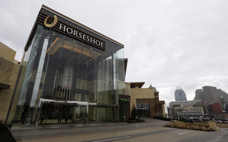 FILE - This photo made, Tuesday, Feb. 26, 2013, in Cincinnati, shows Horseshoe Casino Cincinnati. The last of four voter-approved Ohio casinos is celebrating its first birthday — and revenue has failed to meet expectations. (AP Photo/Al Behrman)