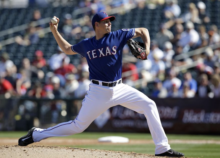 Texas Rangers' Tanner Scheppers works against the Cleveland Indians in the fifth inning of a spring training exhibition baseball game, Monday, March 3, 2014, in Surprise , Ariz. (AP Photo/Tony Gutierrez)