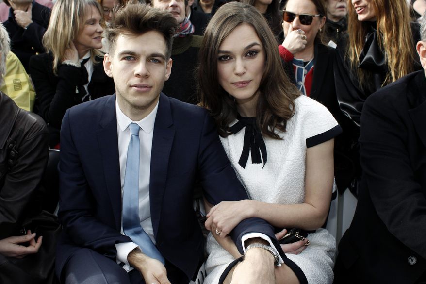 Actress Keira Knightley and her husband James Righton pose as they attend Chanel's ready to wear fall/winter 2014-2015 fashion collection presented in Paris, Tuesday, March 4, 2014. (AP Photo/Thibault Camus)