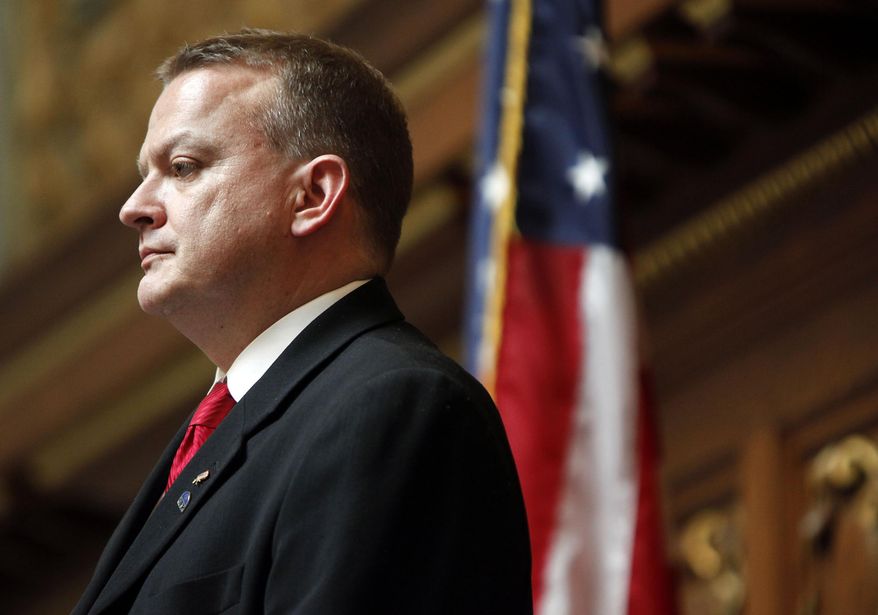 In this Feb. 22, 2011 photo then Speaker Pro Tempore Bill Kramer listens to members of the Wisconsin Assembly in Madison, Wis. Republicans who control the Wisconsin state Assembly voted Tuesday, March 4, 2014 to strip Kramer, the majority leader, of his leadership post amid allegations that he groped one woman and verbally abused another during a trip to Washington last week. (AP Photo/Wisconsin State Journal, M.P. King)