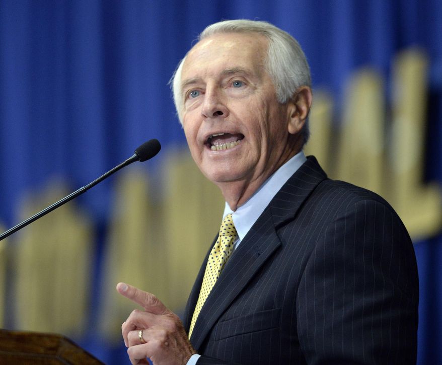 FILE - In an Aug. 22, 2013 file photo, Kentucky Gov. Steve Beshear addresses the audience at the 50th annual Kentucky Country Ham Breakfast, at the Kentucky State Fairgrounds in Louisville, Ky. Beshear on Tuesday, March 4, 2014 said that the state will hire outside attorneys to appeal a judge’s decision granting legal recognition to same-sex couples married in other states and countries after the attorney general announced that he would not pursue the case further. (AP Photo/Timothy D. Easley, File)