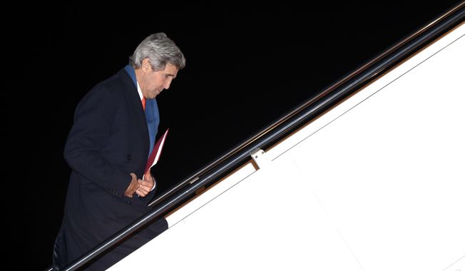 U.S. Secretary of State John Kerry departs Andrews Air Force Base, Md., en route to Ukraine, Monday, March 3, 2014. In remarks Monday, U.S. President Barack Obama said Kerry will propose ways in which a negotiation between Russia and Ukraine could be overseen by a multilateral organization when he goes to Kiev on Tuesday. (AP Photo/Kevin Lamarque, Pool)