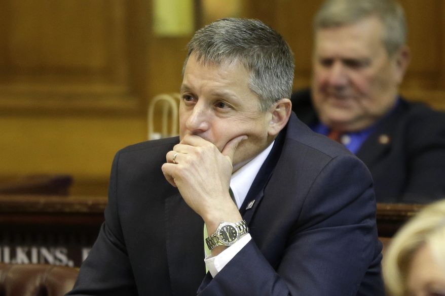 Rep. Bruce Westerman, R-Hot Springs, listens to discussion of Arkansas&#x27; plan that uses Medicaid funds to buy private insurance for the poor on the House floor at the Arkansas state Capitol in Little Rock, Ark., Tuesday, March 4, 2014. The measure, opposed by Westerman, passed in the House Tuesday. (AP Photo/Danny Johnston)