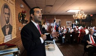 George P. Bush makes a campaign stop in El Paso, Texas, on Monday, March 3, 2014.  In the nation’s first primary of the season, Texas politicians scramble to fill a void left by an extraordinary shakeup in state offices. Bush, the nephew of one former president, grandson of another and son of an ex-Florida governor is expected to officially join the family business of winning elections when he secures the Republican land commissioner nomination during Tuesday’s Texas primary. (AP Photo/ Juan Carlos Llorca)