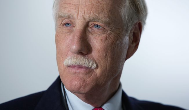 ** FILE ** Sen. Angus King, I-Maine, pauses during an interview with The Associated Press, Friday, May 3, 2013, in Portland, Maine. (AP Photo/Robert F. Bukaty)
