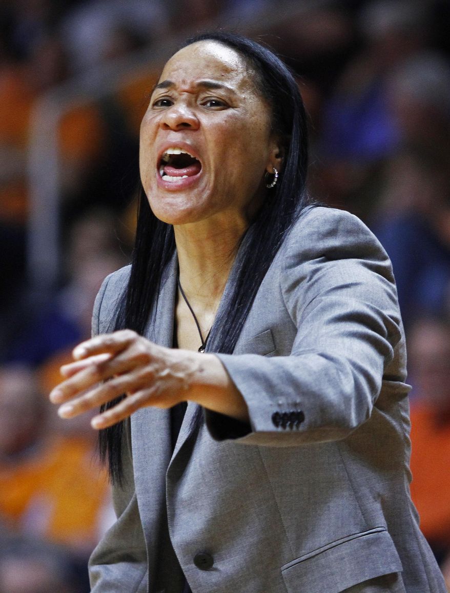 South Carolina coach Dawn Staley yells to her team in the second half of an NCAA college basketball game against Tennessee on Sunday, March 2, 2014, in Knoxville, Tenn. Tennessee won 73-61. (AP Photo/Wade Payne)