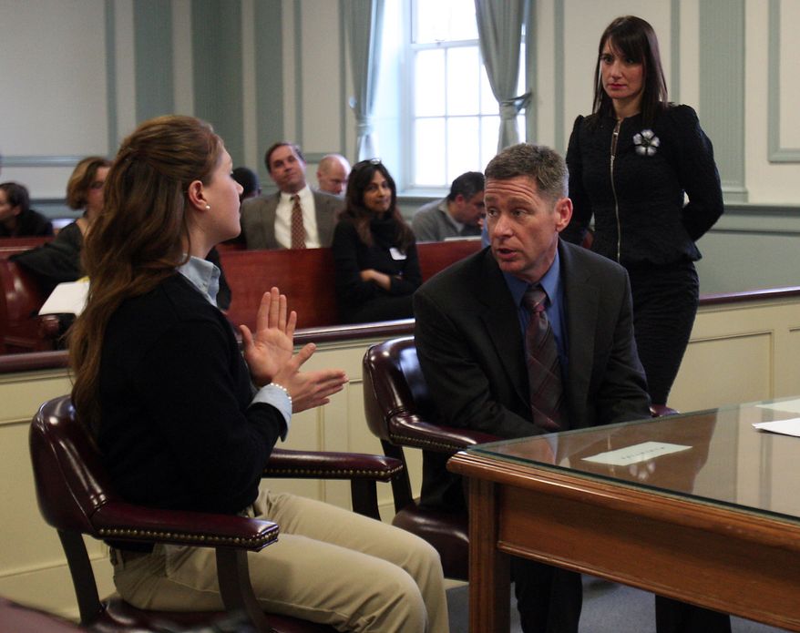 High school senior Rachel Canning, 18, left, talks with her father, Sean Canning, during a break in proceedings, in Morris County Superior Court in Morristown, N.J., Tuesday, March 4, 2014. Rachel Canning is suing her parents for financial support and college tuition after she claims they threw her out of the home. (AP Photo/Daily Record, Bob Karp, Pool)