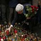 Associated Press
Secretary of State John F. Kerry remembers Ukrainian protesters at the Shrine of the Fallen in Kiev. Over the course of the Maidan demonstrations, almost 100 were killed by police.