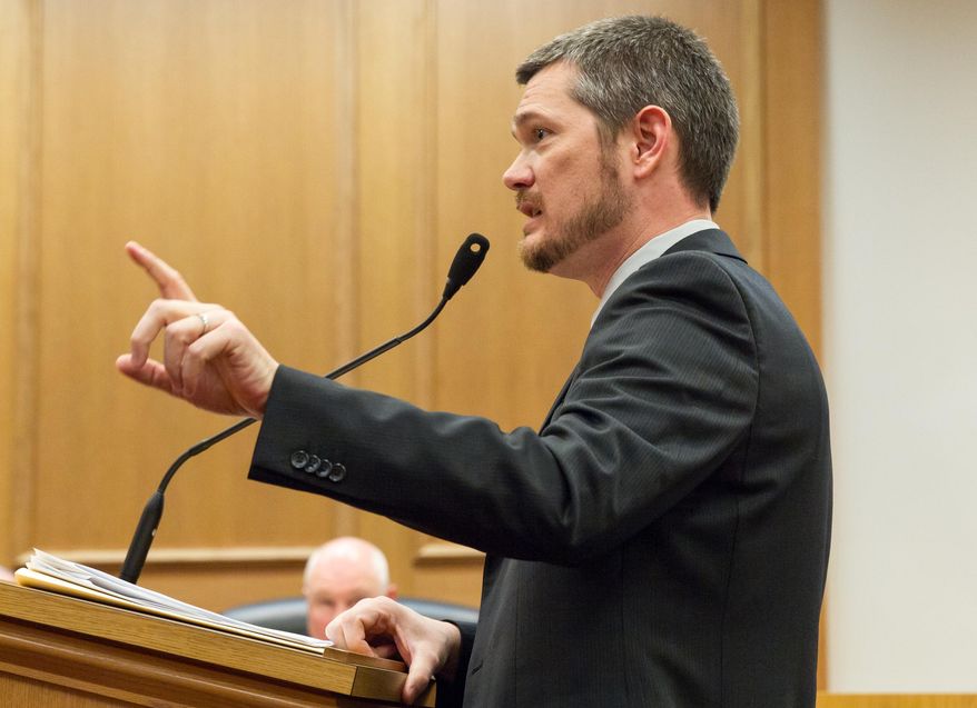 Rep. Tilman Goins, R-Morristown, discusses his bill to strip local governments of the power to ban guns in local parks during a House Civil Justice Subcommittee hearing in Nashville, Tenn., in Wednesday, March 5, 2014. The panel later advanced the measure that Republican Gov. Bill Haslam has expressed misgivings about. (AP Photo/Erik Schelzig)