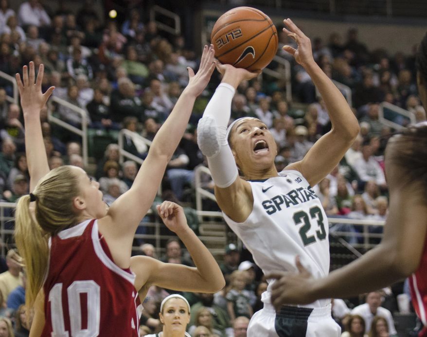 Michigan State's Aerial Powers, right, shoots over Indiana's Taylor Agler during an NCAA college basketball game Sunday, March 2, 2014, in East Lansing, Mich. (AP Photo/The Saginaw News, Tim Goessman) LOCAL TV OUT LOCAL INTERNET OUT