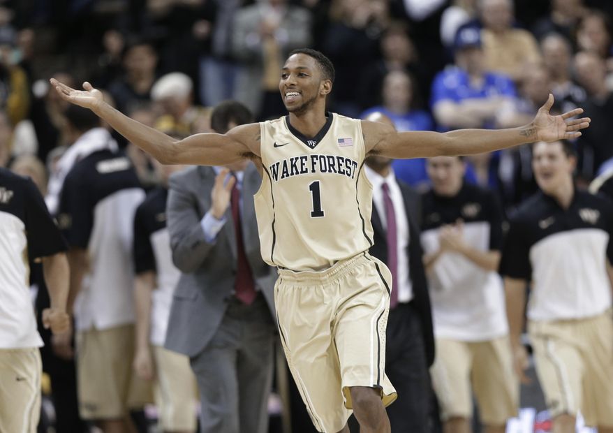 Wake Forest's Madison Jones celebrates in the closing minutes of an NCAA college basketball game against Duke in Winston-Salem, N.C., Wednesday, March 5, 2014. Wake Forest won 82-72. (AP Photo/Chuck Burton)
