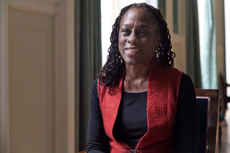 New York City first lady Chirlane McCray is interviewed at New York's City Hall, Wednesday, March 5, 2014. McCray will lobby for her husband's pre-kindergarten plan in Albany next week, The trip was revealed to The Associated Press on Wednesday during her first extensive interview since her husband Bill de Blasio took office in January. (AP Photo/Richard Drew)