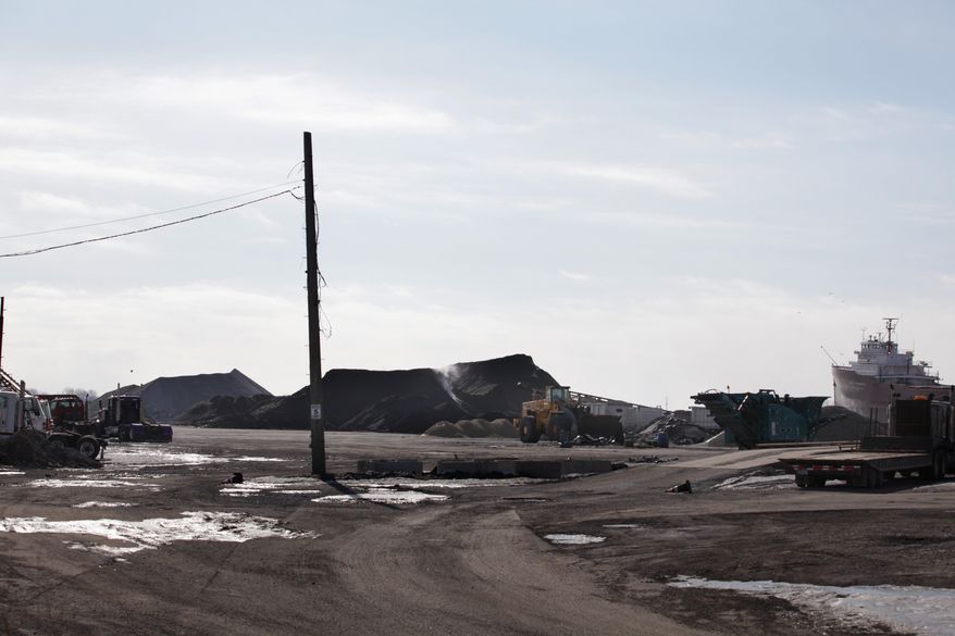 This Feb. 28, 2014 photo shows Detroit Bulk Storage headquarters in River Rouge, Mich. Photographed on Friday, Feb. 28, 2014. A proposal to store petroleum coke along the Detroit River has drawn opposition from some area residents after problems at another southeastern Michigan storage site. The Michigan Department of Environmental Quality plans a community meeting Wednesday, March 5 in Wyandotte on the proposal to use a 15-acre site in nearby River Rouge. Petcoke piles along the river in Detroit drew complaints last year and city officials ordered them removed. (AP Photo/Detroit Free Press, Romain Blanquart) DETROIT NEWS OUT; NO SALES