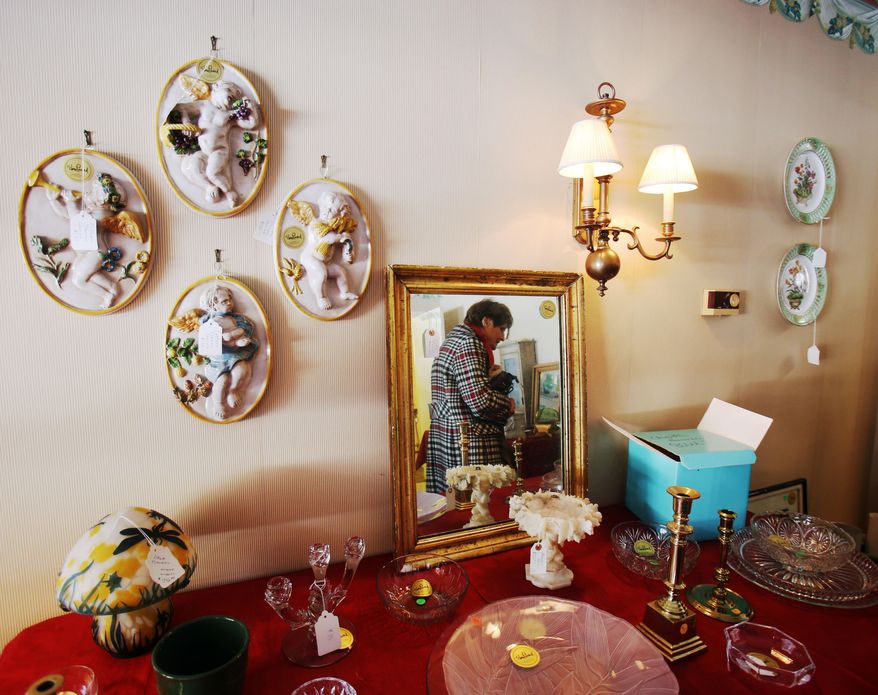 Thursday March 6, 2014, was the first day of the estate sale at Elmore Leonard's home at 2192 Yarmouth in Bloomfield Township, Mich. The sale was organized and run by his family members. Most of the items for sale have a gold sticker with Elmore Leonard's name on it. (AP Photo/Detroit Free Press, Regina H. Boone)