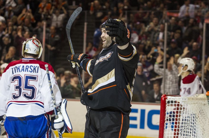 Anaheim Ducks right wing Daniel Winnik (34) celebrates his goal during the second period of an NHL hockey game, Wednesday, March 5, 2014, in Anaheim, Calif. (AP Photo/Ringo H.W. Chiu)
