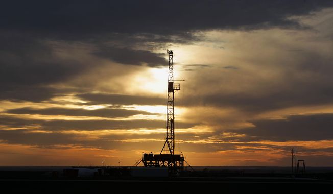 This Feb. 17, 2014 photo shows a drilling rig in Howard county, Texas as the sun sets. The federal Occupational Safety and Health Administration keeps a list of &amp;quot;the worst of the worst&amp;quot; employers in the nation and drilling companies with multiple fatalities should be on it, safety experts say. (AP Photo/Houston Chronicle, James Nielsen)
