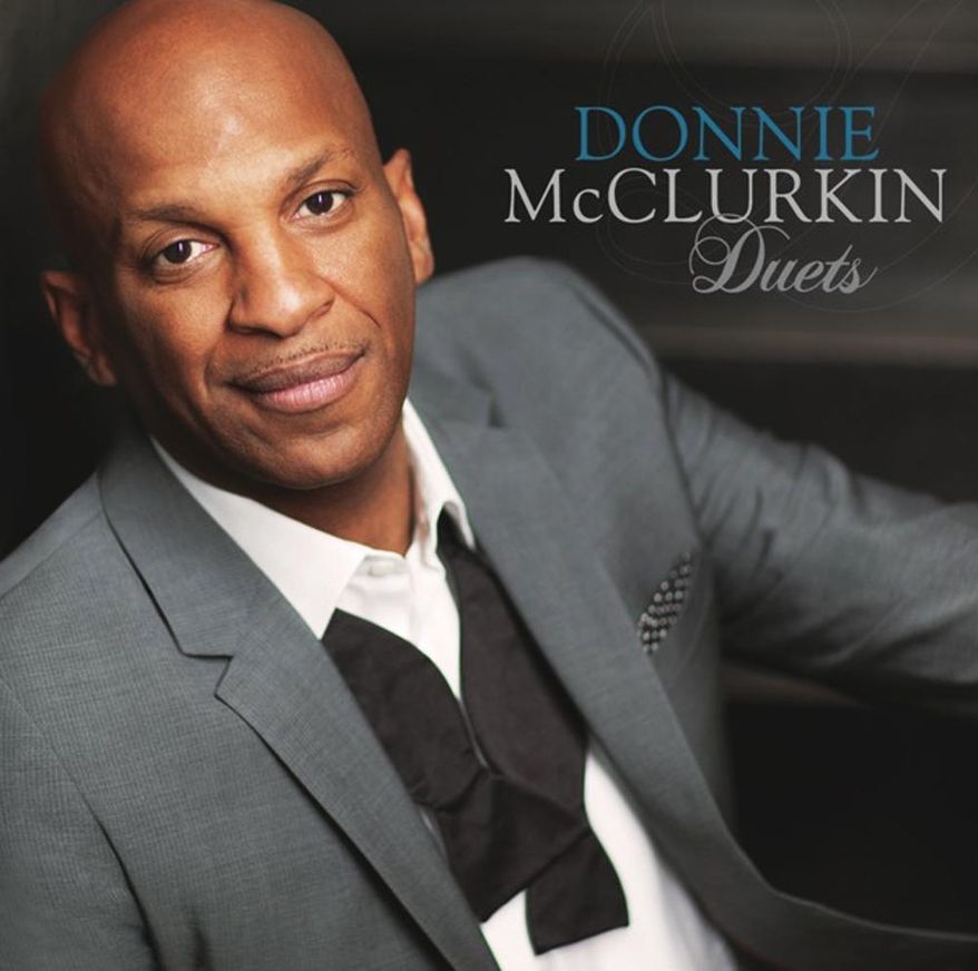 This photo provided by RCA Inspirational shows the cover of Donnie McClurkin’s album, “Duets” (RCA Inspirational). (AP Photo/RCA Inspirational)