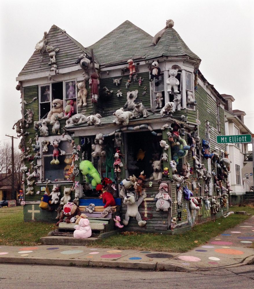 In this Nov. 21, 2013 photo, stuffed animals are seen attached to "The Party Animal House" in the Heidelberg Art Project in Detroit. Another fire has burned a house that's part of the outdoor art installation. WDIV-TV reports that the fire department responded early Friday, March 7, 2014 to the fire on the city's east side that destroyed the building. "The Heidelberg Project has been the target of at least eight earlier suspicious fires. There have been no arrests related to the fires that started in May 2013, but local and federal officials are investigating. Tyree Guyton founded the east-side project in 1986 as a response to urban decay. (AP Photo/Carlos Osorio)