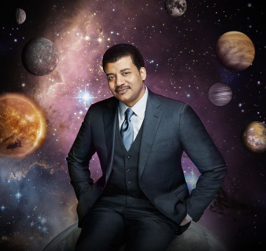 This photo released by Fox shows Neil deGrasse Tyson, the astrophysicist who hosts the television show, "Cosmos: A Spacetime Odyssey," on Fox and simultaneously across multiple U.S. Fox networks. (AP Photo/Fox, Patrick Eccelsine) ** FILE **