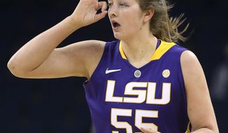 LSU forward Theresa Plaisance gestures after hitting a 3-point basket against Tennessee during the first half of an NCAA college basketball game in the quarterfinals of the Southeastern Conference women&#39;s tournament, Friday, March 7, 2014, in Duluth, Ga. (AP Photo/Jason Getz)