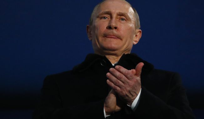 Russian President Vladimir Putin attends the opening ceremony of the 2014 Winter Paralympics at the Fisht Olympic stadium  in Sochi, Russia, Friday, March 7, 2014.  (AP Photo/Dmitry Lovetsky)