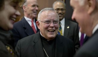 Archbishop of Philadelphia Charles Chaput, laughs with Pennsylvania Gov. Tom Corbett, right, and his wife Susan during a news conference, Friday, March 7, 2014, in Philadelphia. Vatican officials say Philadelphia is scheduled to host a large gathering of the Roman Catholic church called the World Meeting of Families in September 2015. Chaput and others are scheduled to visit Rome this month to invite the pope to the eighth World Meeting of Families. (AP Photo/Matt Rourke)
