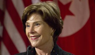 Former first lady Laura Bush speaks during George W. Bush Institute&#39;s fellowship program on International Women&#39;s Day at the George W. Bush Presidential Center, March 7, 2014, in Dallas. (AP Photo/The Dallas Morning News, Sarah Hoffman) ** FILE **
