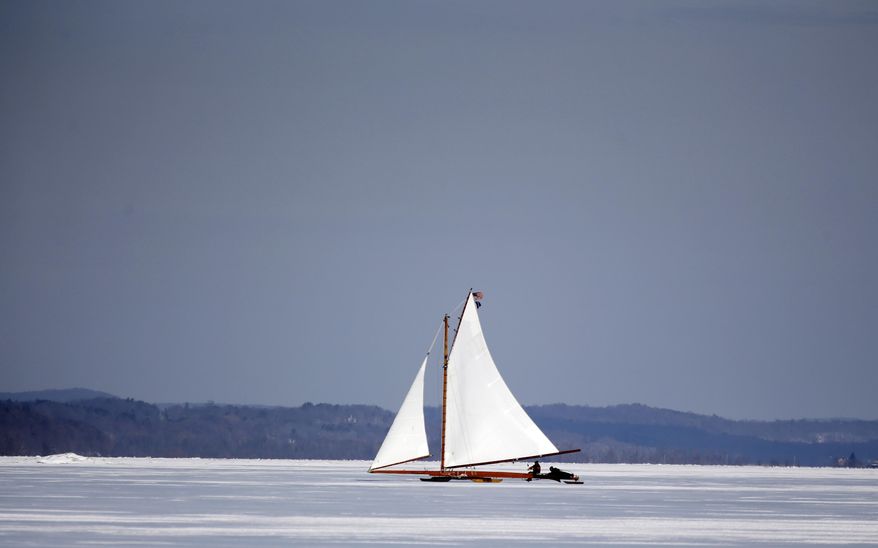 The ice boat Jack Frost sails along the Hudson River on Saturday, March 1, 2014, in Barrytown, N.Y. This year’s frigid winter has created excellent conditions for ice sailing on the Hudson River in New York. (AP Photo/Mike Groll)