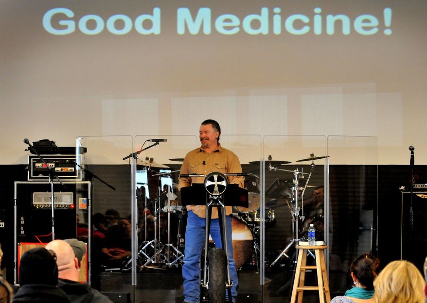 JD Tew, pastor at the Freedom Biker Church addresses the congregation on Sunday, Feb. 16, 2014. (AP Photo/The Fayetteville Observer, Cindy Burnham.)