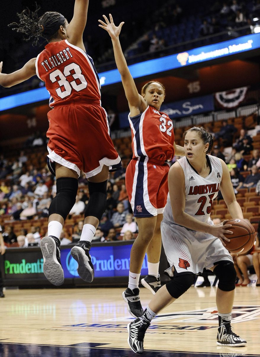 Louisville's Shoni Schimmel, right, looks to pass as Houston's Tyler Gilbert, top left, and Te'onna Campbell defend during the first half of an NCAA college basketball game in the quarterfinals of the American Athletic Conference women's tournament, Saturday, March 8, 2014, in Uncasville, Conn. (AP Photo/Jessica Hill)