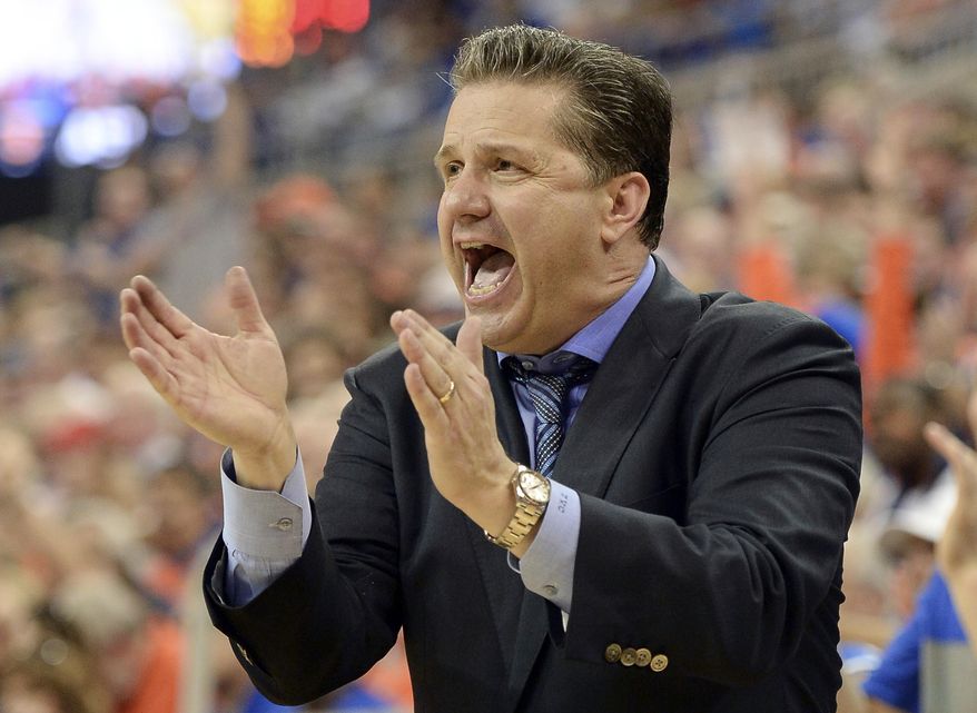 Kentucky coach John Calipari cheers his team on during the second half of an NCAA college basketball game against Florida Saturday, March 8, 2014, in Gainesville, Fla. Florida defeated Kentucky 84-65. (AP Photo/Phil Sandlin)