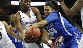 South Carolina center Elem Ibiam (33) and Kentucky forward/center Azia Bishop (50) battle for a rebound in the first half an NCAA college basketball game in the semifinals of the Southeastern Conference women&#x27;s basketball tournament Saturday, March 8, 2014, in Duluth, Ga. (AP Photo/John Bazemore)