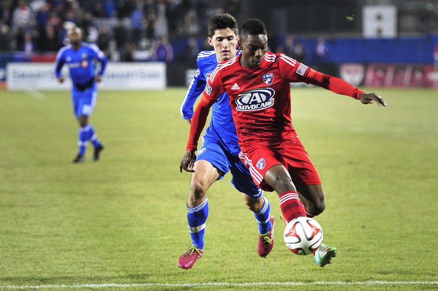 FC Dallas's Fabian Castillo traps the ball with his foot as Montreal's Eric Miller defends during an MLS soccer game Saturday, March 8, 2014, in Frisco, Texas. (AP Photo/The Dallas Morning News, Matthew Busch) MANDATORY CREDIT; MAGS OUT; TV OUT; INTERNET USE BY AP MEMBERS ONLY; NO SALES